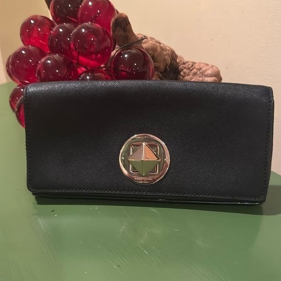 kate spade Handbags - Kate Spade Black with gold. Clutch.